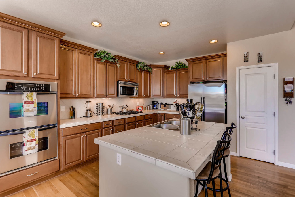 11609 S Flower Mound Way-print-009-25-Kitchen with Pantry-2700x1799-300dpi